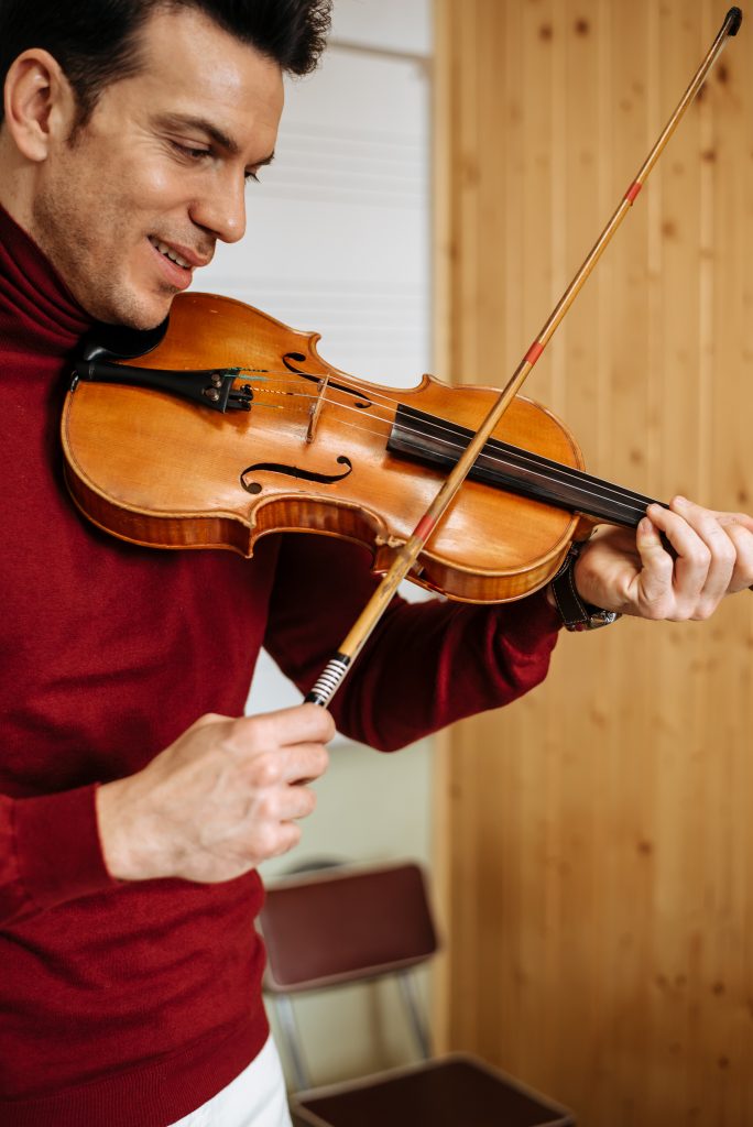 an artist playing violin