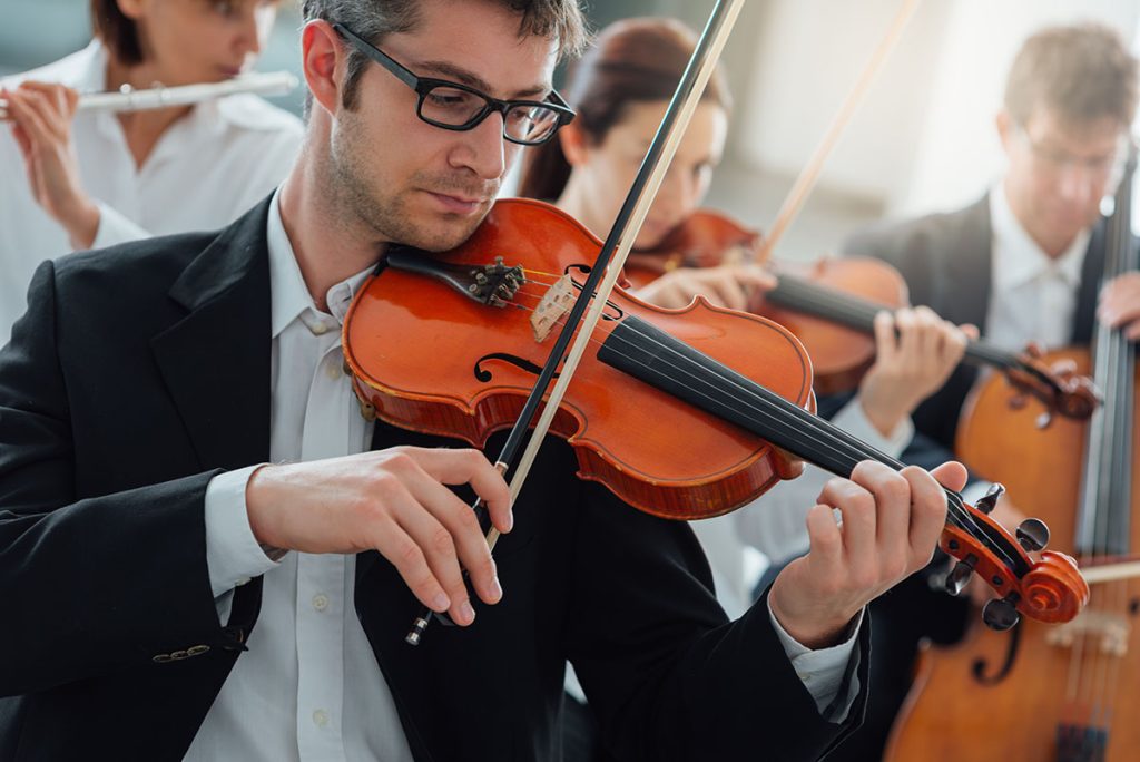 person playing a violin