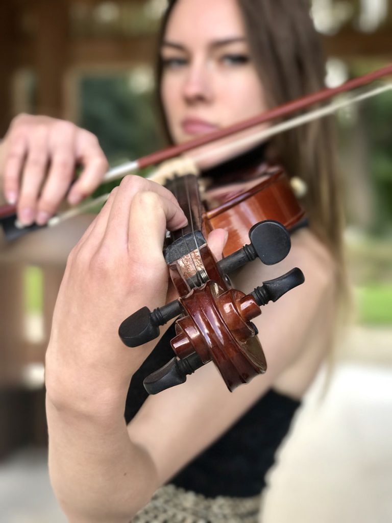 young woman playing violin